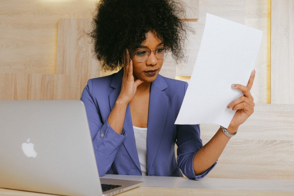 Woman looking at cover letter